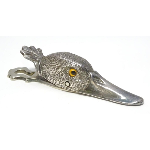 220 - A Novelty silver plate letter / paper clip formed as a duck head 5'' long