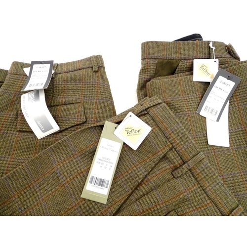 299 - Three pairs of Laksen tweed trousers, UK size 37 (3)
