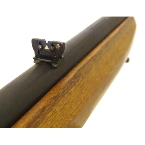 390 - Firearm: an Anschutz 'Modell 525' .22LR semi-automatic rimfire rifle, beech pistol-grip stock with c... 