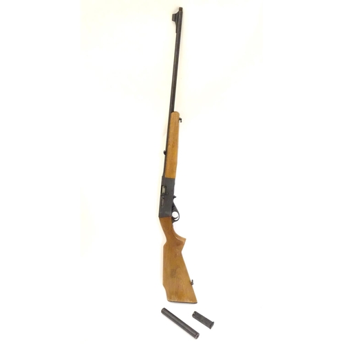 390 - Firearm: an Anschutz 'Modell 525' .22LR semi-automatic rimfire rifle, beech pistol-grip stock with c... 