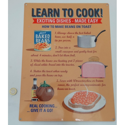 192 - A 21stC metal sign, 15 3/4'' x 11 3/4'' wide, 'Learn to Cook' 'Exciting dishes-Made easy'