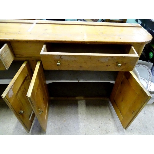 195 - A pine dresser base / sideboard