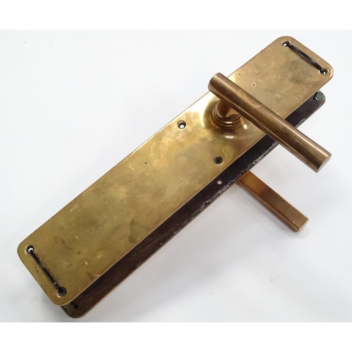 197 - A pair of early to mid 20thC brass door plates, handle and mechanism