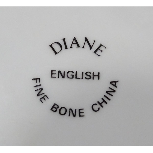 198 - A large quantity of ceramics to include Meakin 'Rosa' pattern