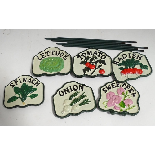 210 - A box of cast iron vegetable labels on stands