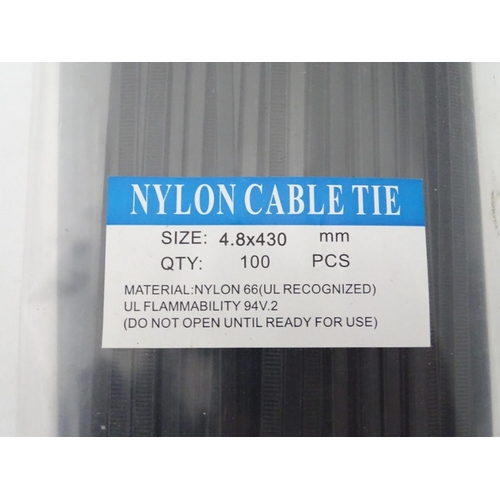 212 - Two packets of black plastic cable ties, 430 mm long