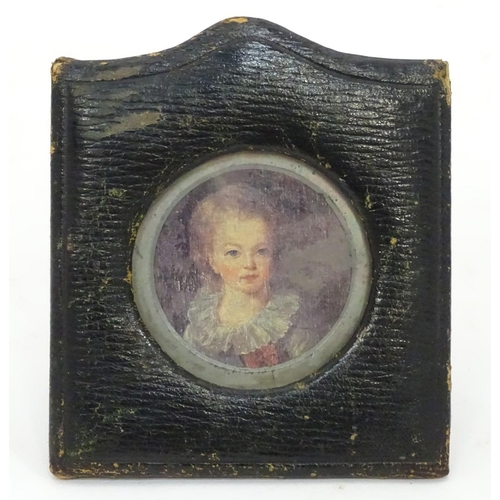 221 - A small leathered picture frame