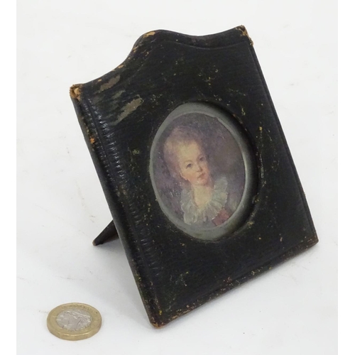 221 - A small leathered picture frame