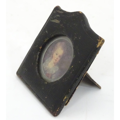 221 - A small leathered picture frame