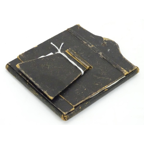 221 - A small leathered picture frame