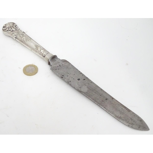 233 - A white metal handled knife