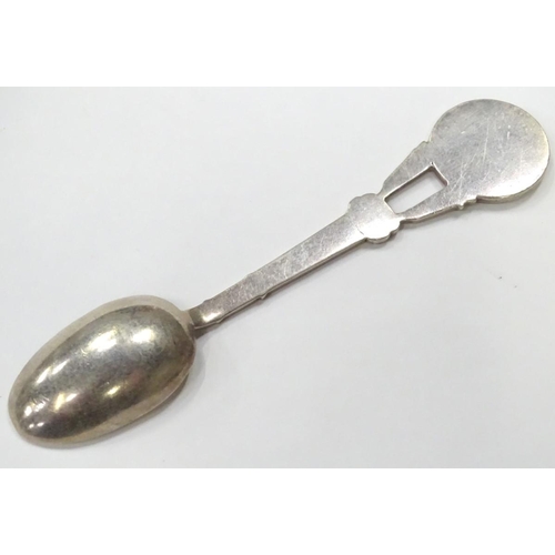 239 - A white metal spoon, the stem formed as two rifles with guards emblem