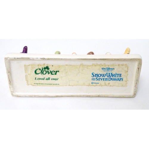 248 - 'Clover, Loved all over', an advertising ceramic toast rack in the form of Walt Disney's Classic Sno... 