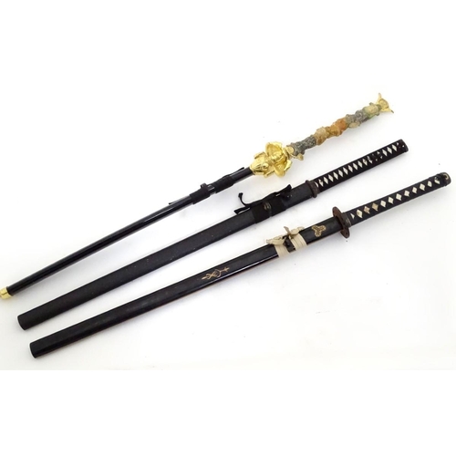 272 - Three replica Samurai swords