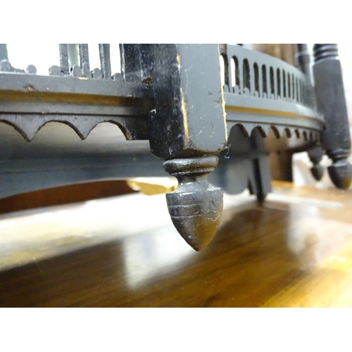 298 - An aesthetic movement mirror with shelves