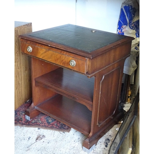 303 - A leather topped mahogany desk
