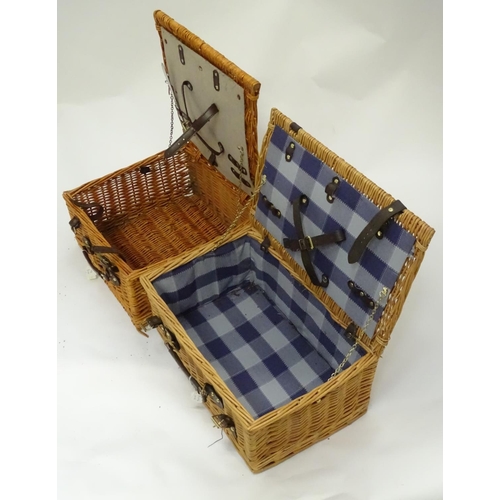 321 - Two fitted picnic baskets, size approx. 18'' x 11 1/2'' x 8 1/2'' and 16'' x 15''  x 8 1/2''
