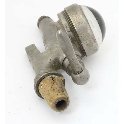 226 - The Optic pearl, A cast Maskal and Chambers cast metal pearl optic with bulls eye glass. 5'' high