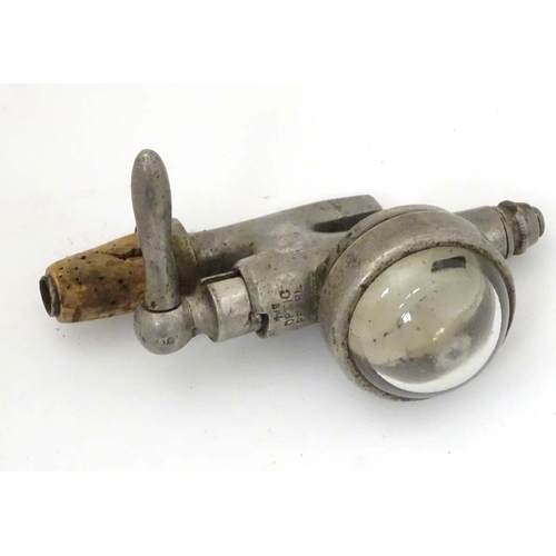 226 - The Optic pearl, A cast Maskal and Chambers cast metal pearl optic with bulls eye glass. 5'' high