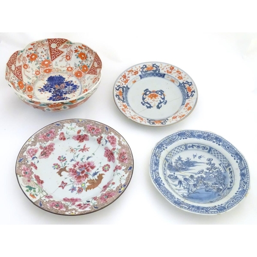 18 - A quantity of oriental ceramics, to include an 18thC floral plate, an Imari bowl with panelled decor... 