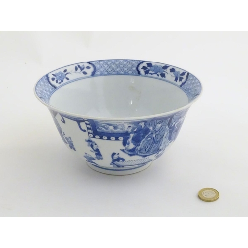 5 - A Chinese blue and white footed bowl with a flared rim, decorated with a scene depicting the enterta... 