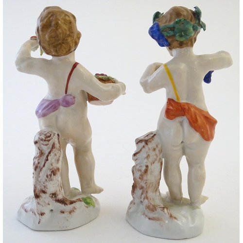 45 - Two Italian putti / cherub figures depicting the seasons Spring and Summer, one with a basket of flo... 