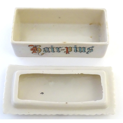 57 - Two pieces of crested ware, to include a Carlton China lidded hair pin box, the top decorated with t... 