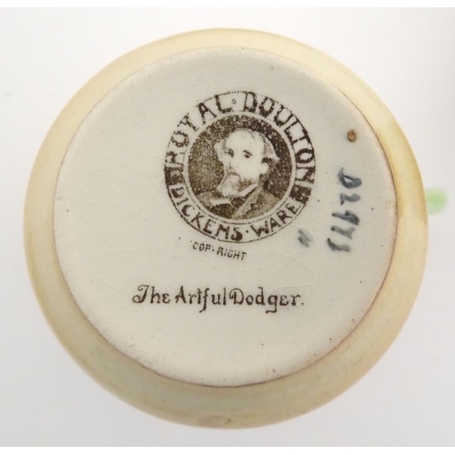 123 - A quantity of Royal Doulton Dickens wares to include a Bill Sykes cup and saucer, a Sam Weller sauce... 