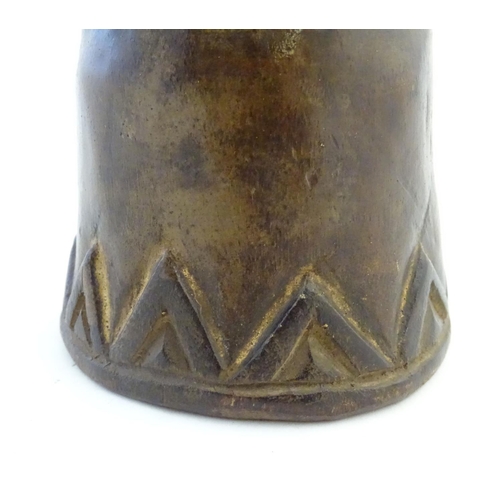 540 - Ethnographic / Native / Tribal: A carved African wooden bell / vessel with geometric detail surmount... 
