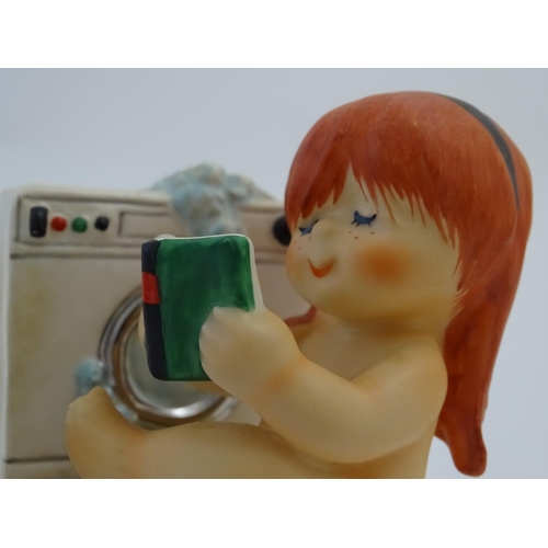 102 - Four Goebel Redhead figures by Charlot Byj, comprising Lazy Day, a red haired boy fishing in a boat,... 