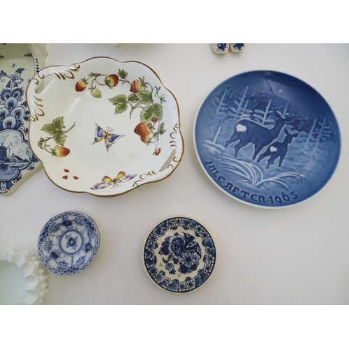 113 - A quantity of assorted ceramics to include two Royal Copenhagen miniature plates with hand painted f... 