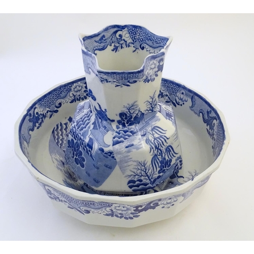 114 - A late 19th / early 20thC Mason's Ironstone China blue and white wash bowl and pitcher / jug decorat... 