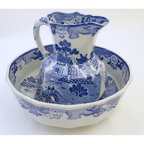 114 - A late 19th / early 20thC Mason's Ironstone China blue and white wash bowl and pitcher / jug decorat... 