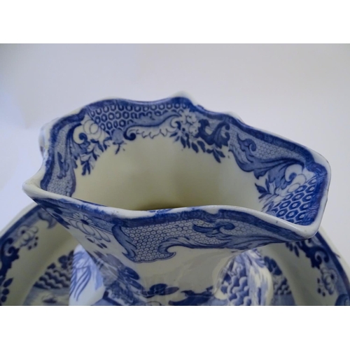 114 - A late 19th / early 20thC Mason's Ironstone China blue and white wash bowl and pitcher / jug decorat... 