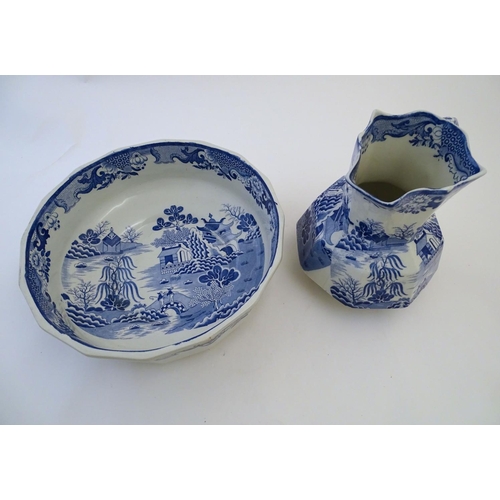 114 - A late 19th / early 20thC Mason's Ironstone China blue and white wash bowl and pitcher / jug decorat... 