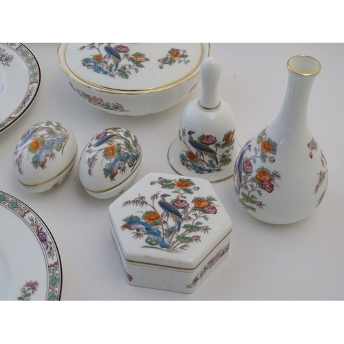 122 - A quantity of Wedgwood wares in the pattern Kutani Crane, depicting birds and flowers in a landscape... 