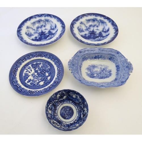 127 - A quantity of assorted blue and white ceramic wares to include a Japanese bowl decorated with figure... 