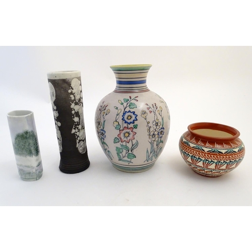 130 - Four assorted vases, comprising A New Mexico Navajo studio pottery squat vase with incised banded de... 