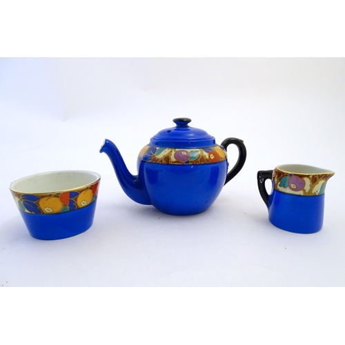 138 - Empire ware tea wares comprising, teapot, sugar bowl and milk jug decorated in the manner of Phoenix... 