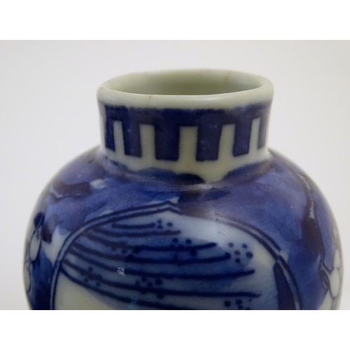 22 - A Chinese blue and white ginger jar decorated with cherry blossom, together with a pair of small bal... 