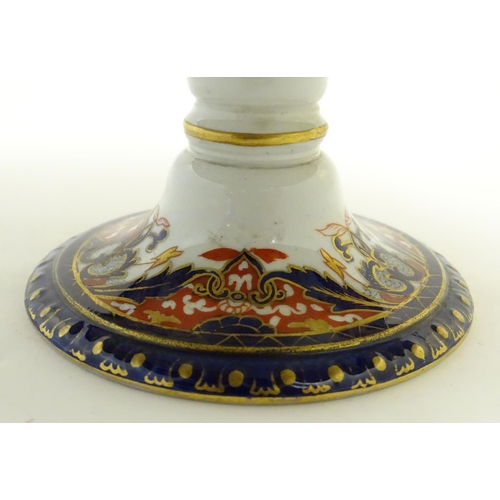 59 - An Ashworth Bros tazza in the Imari palette with floral decoration with gilt highlights. Marked unde... 