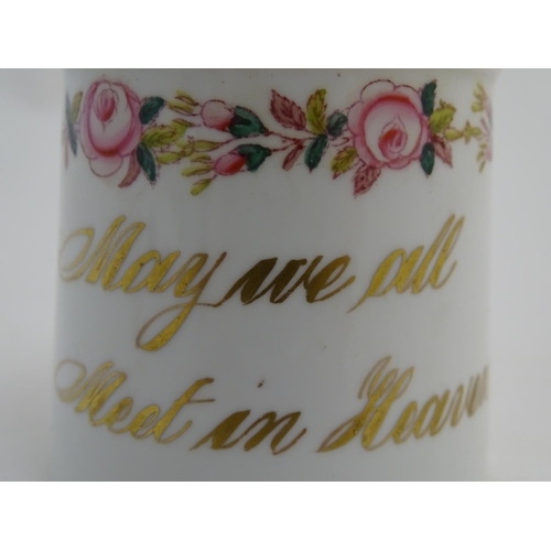 64 - A Victorian porcelain mug bearing the motto 'May we all Meet in Heaven' in gilt lettering with a flo... 