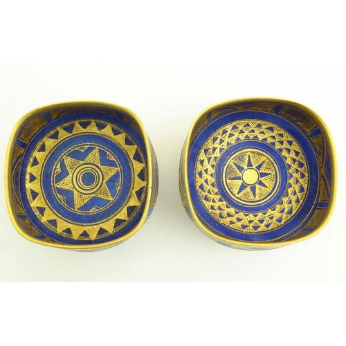 69 - A matched pair of studio pottery footed squared bowls / pots with cobalt blue and gilt geometric dec... 