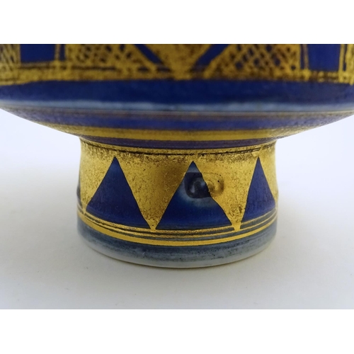 69 - A matched pair of studio pottery footed squared bowls / pots with cobalt blue and gilt geometric dec... 