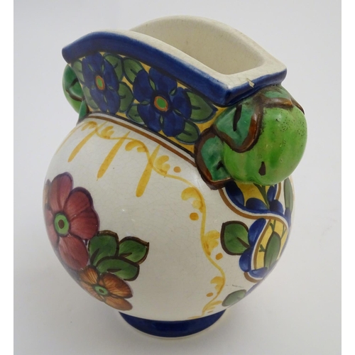 71 - An Alumina faience globular vase with a squared rim and floral decoration. Marked under with Copenha... 