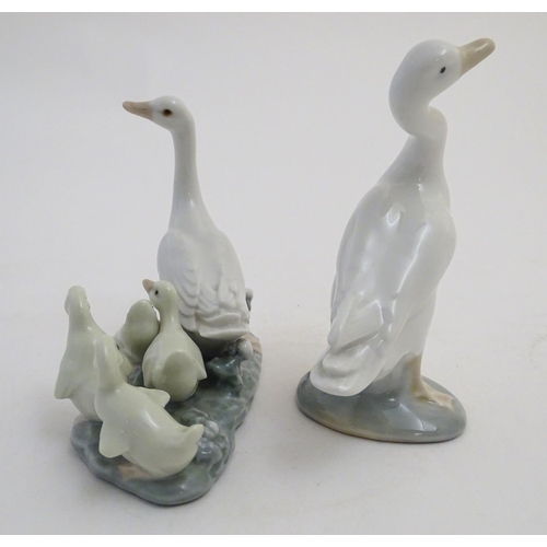 88 - Two Lladro figures models as geese, a Mother Goose and her Goslings figure group, model no. 1307, an... 