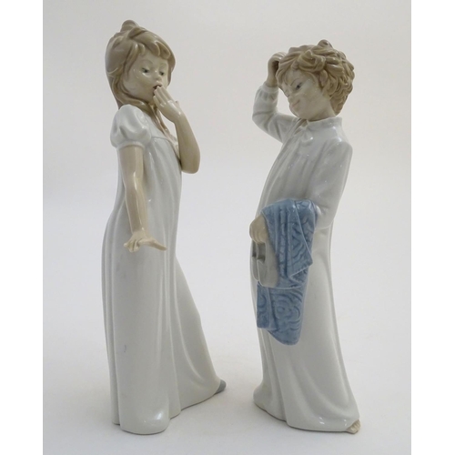 89 - Two Nao bedtime figures to include Yawning Girl, model no. 230, and Boy with Slippers, model no. 232... 