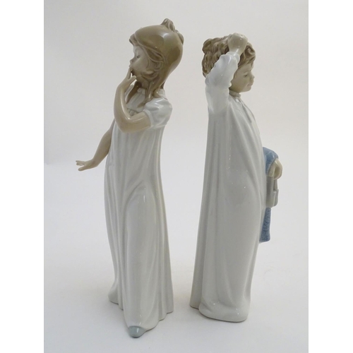 89 - Two Nao bedtime figures to include Yawning Girl, model no. 230, and Boy with Slippers, model no. 232... 