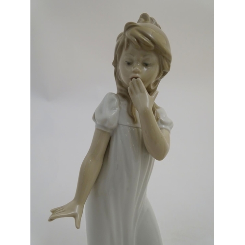 89 - Two Nao bedtime figures to include Yawning Girl, model no. 230, and Boy with Slippers, model no. 232... 