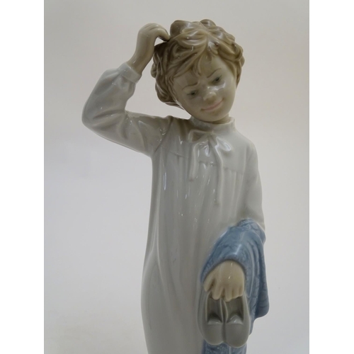 89 - Two Nao bedtime figures to include Yawning Girl, model no. 230, and Boy with Slippers, model no. 232... 